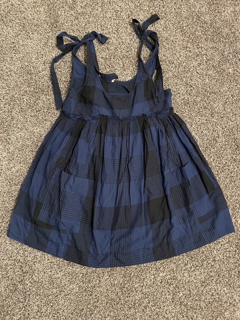 blue and black plaid Free People baby doll dress with tie straps